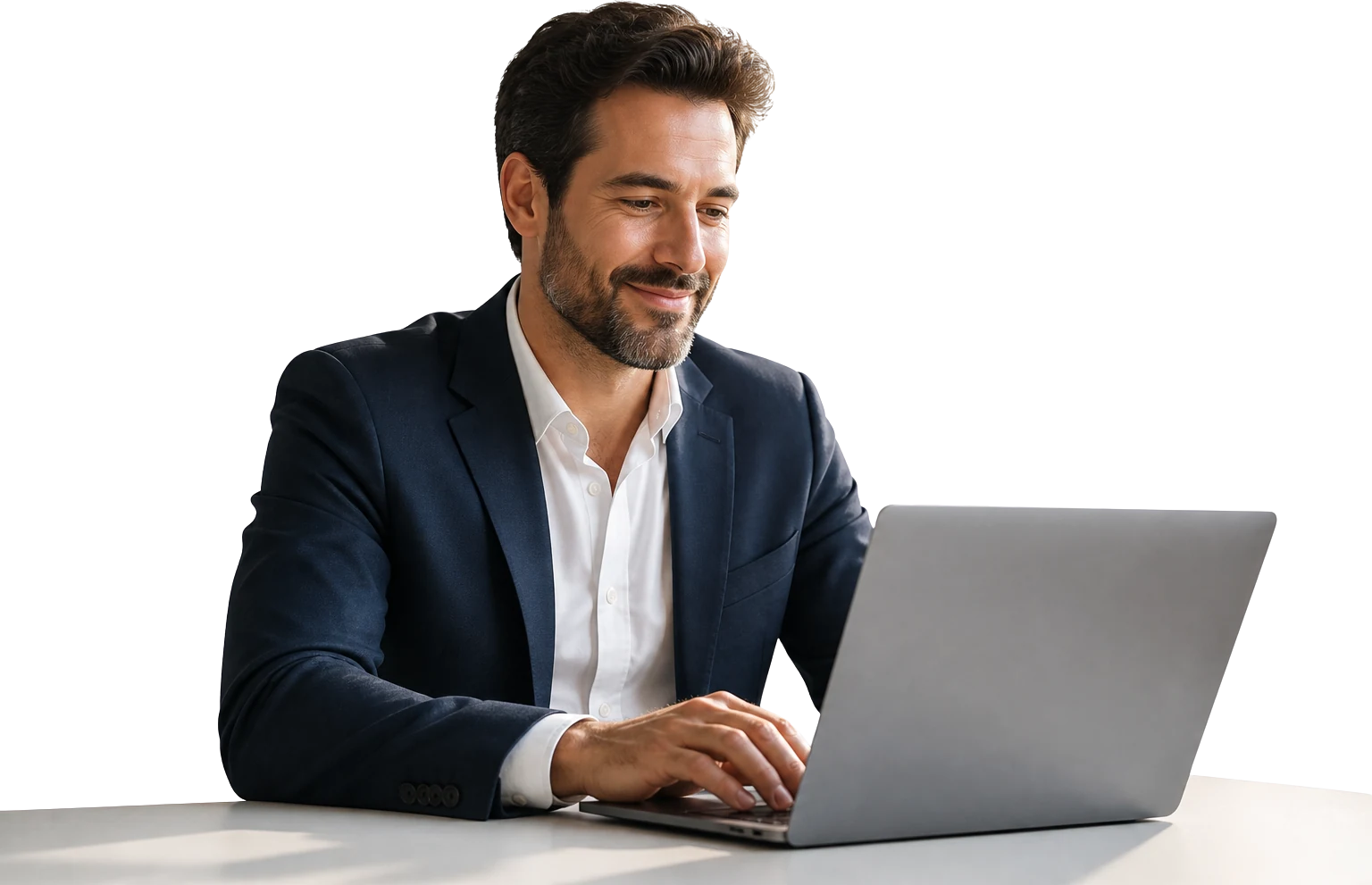 A professional person smiling while working on a laptop.